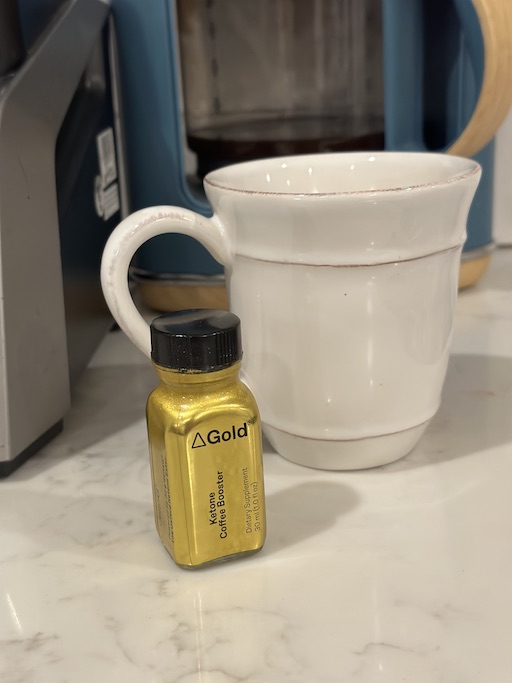 some delta gold next to a cup of coffee