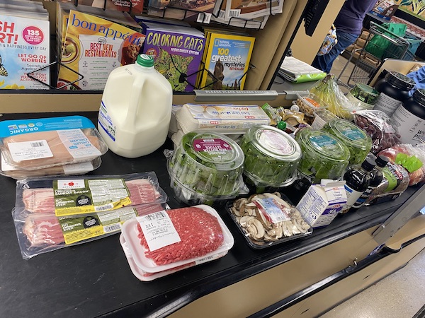 A grocery store belt full of meats