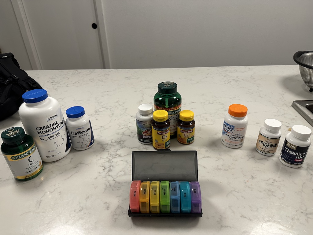 3 groups of pills on a counter